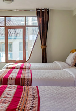Habitación Triple en Yupay Hotel